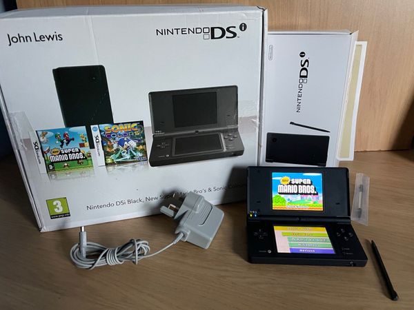 Nintendo DSi with 17 games
