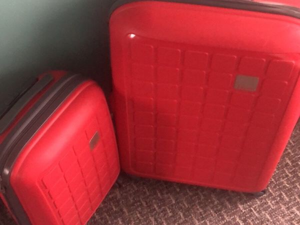 Tripp red suitcases collection only