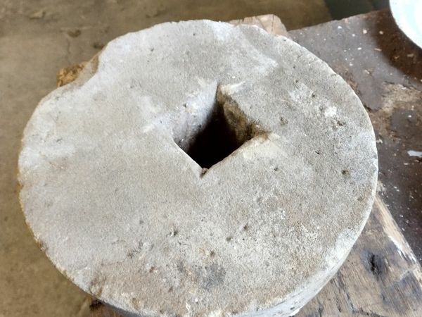 Antique grinding wheel stone