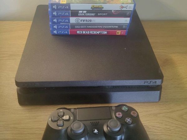 Playstation 4 slim 1TB and 5 games