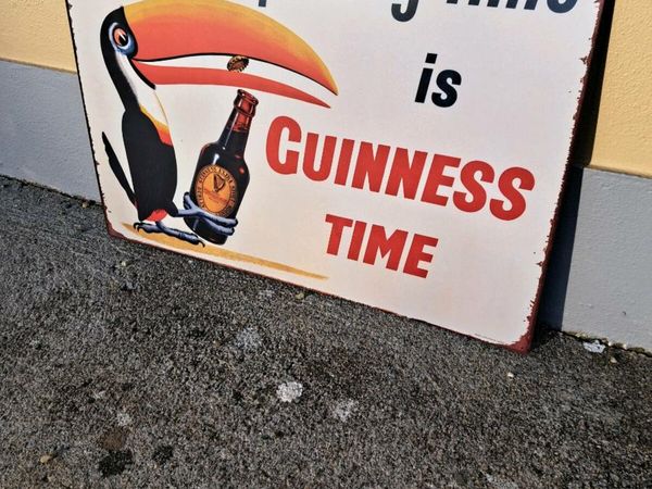 Large Guinness  opening times  metal sign