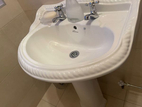 Hand basin and toilet