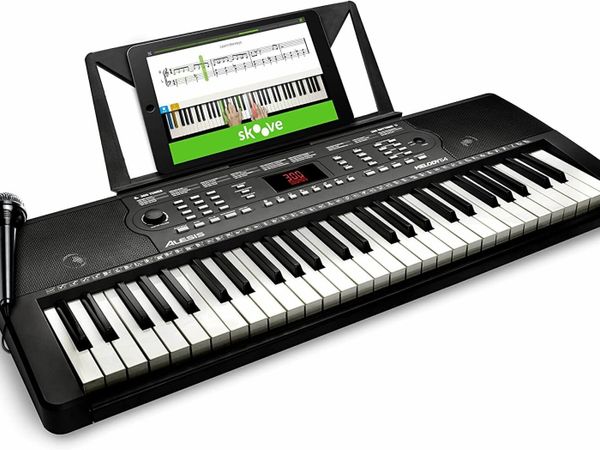 54 Key Keyboard Piano with Speakers, Microphone, 300 Sounds, 300 Rhythms, 40 Demo Songs, Educational Tools and Music Rest