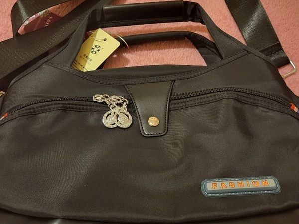 Unused black handbag