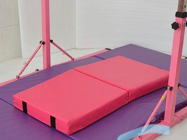 Gymnastics bars for kids with mats
