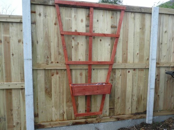 Wall planters with trellis