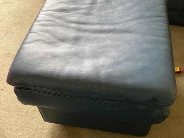 Large blue leather footstool