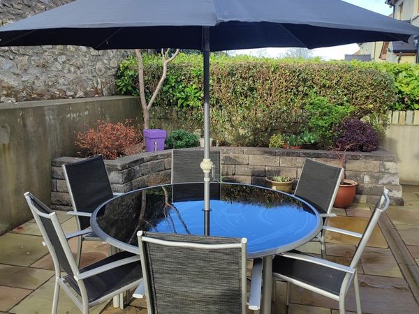 Garden Table, 6 chairs and Parasol