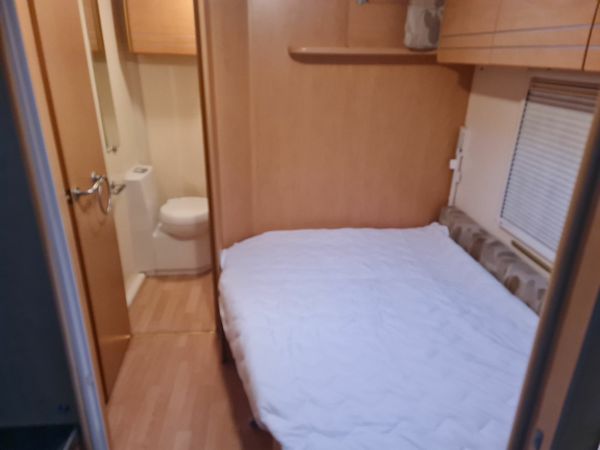 5 berth caravan  fixed bed?? &   optional bunk bed