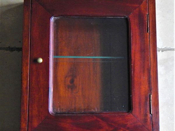 Small wooden display cabinet