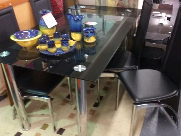 Black glass table and 4 chairs