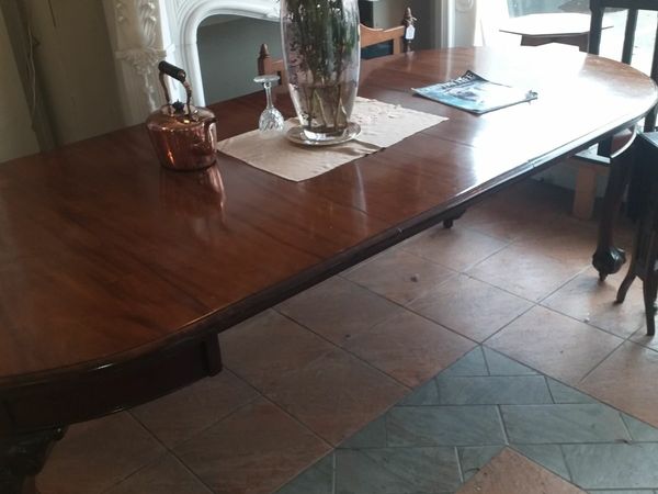 antique long mahogany  dining table