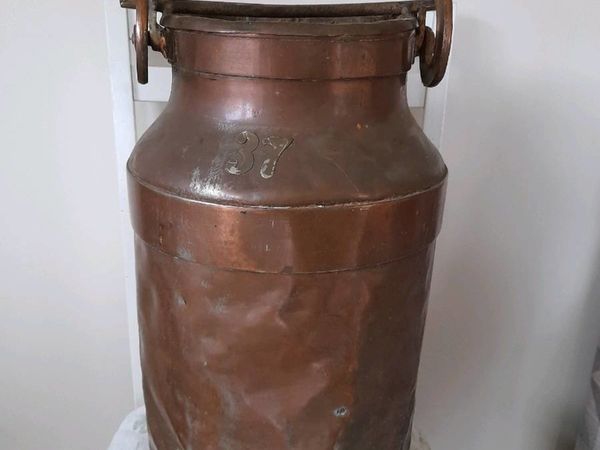 Very old copper churn