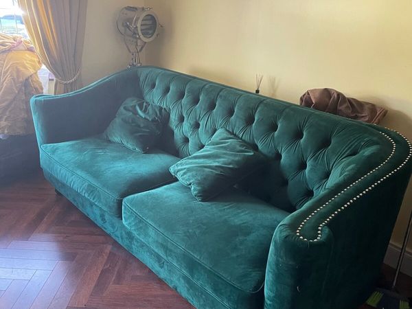 Green velvet Chesterfield sofa