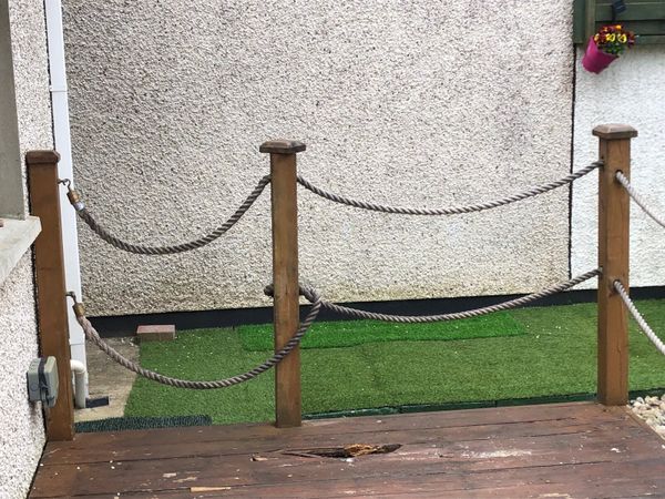Garden decking posts and rope