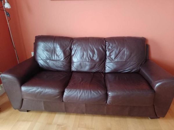 Leather sofa and two arm chairs