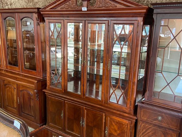 Stunning arch top display cabinet. Glass shelves