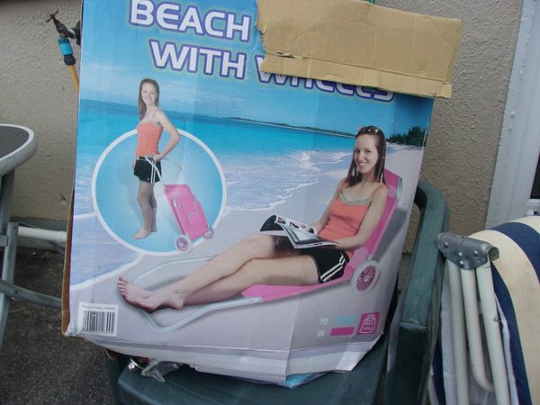 BEACH CHAIR WITH WHEELS  NEW BOXED