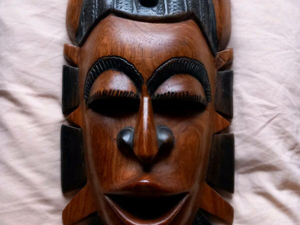 Timber statue and mask