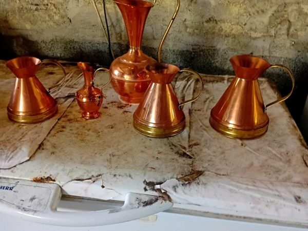 Vintage copper jugs