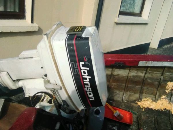 Johnson 25 HP outboard and control's.