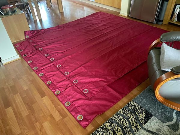Pair of lined burgundy curtains