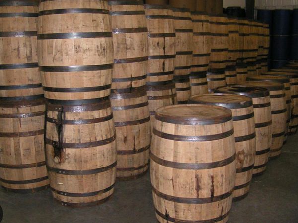 Oak whiskey barrels and planters