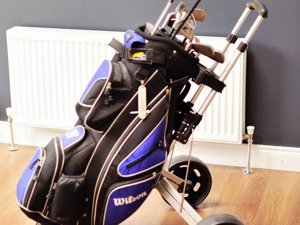 Golf Clubs and Exercise Bike