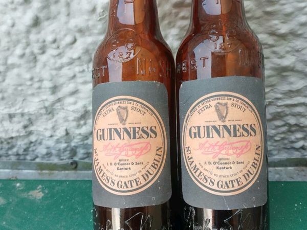 2. 1960 Guinness label bottles
