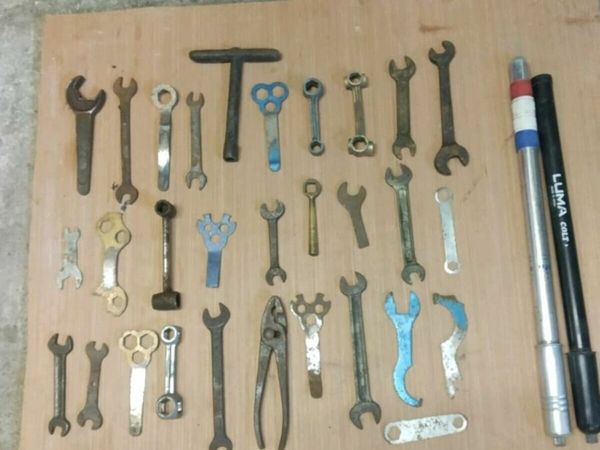 30. Vintage bicycle wrenches + pumps