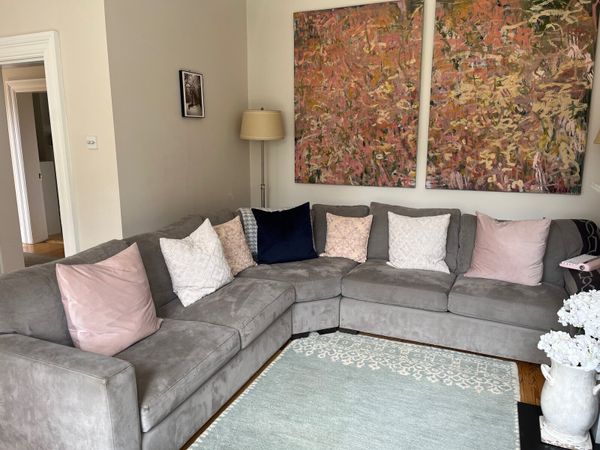 Large grey L shaped couch