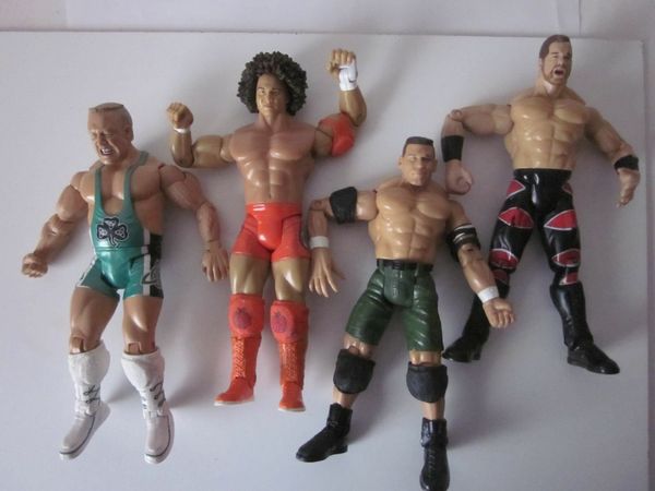 Four WWE Jakks Pacific Wrestling Figures