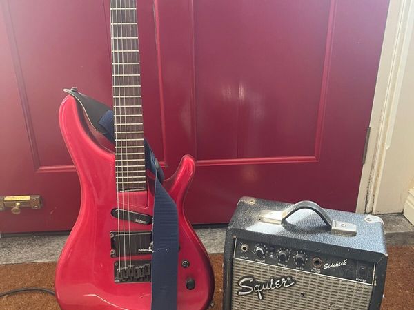 Guitar and fender squire amp