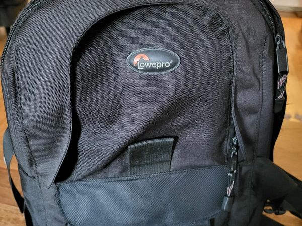 Camera backpack and tripod