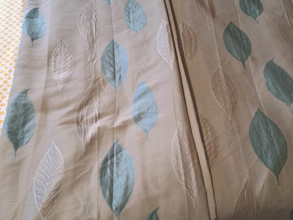 Beige curtains with duck egg blue leaf pattern