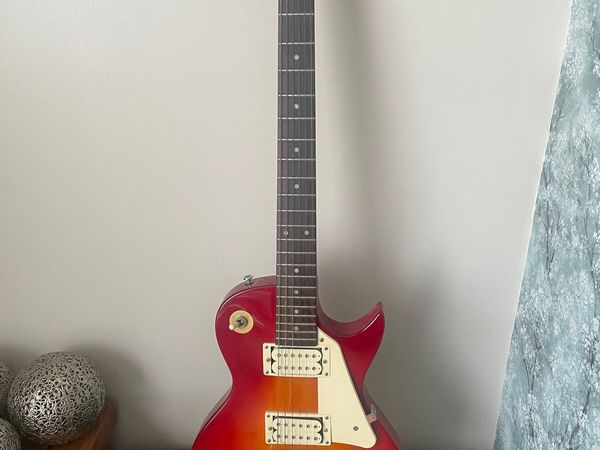 Les Paul replica electric guitar and case