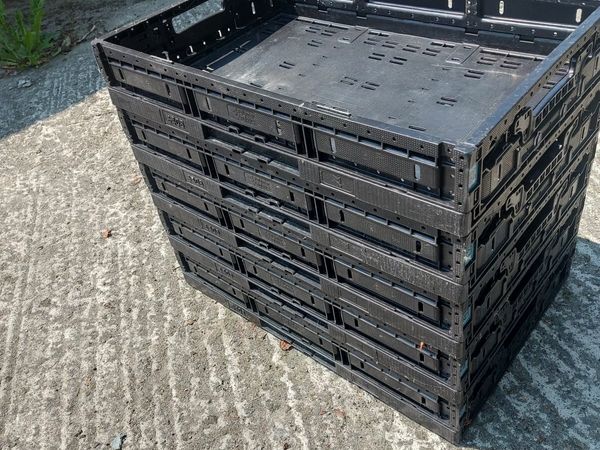 5 black shallow plastic foldable crates