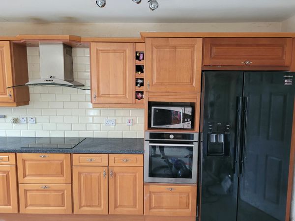 Solid wood cherry kitchen and island for sale.