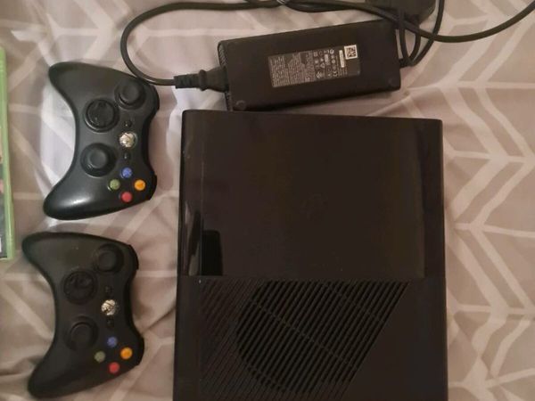 Xbox 360 with 12 games and 2 controllers