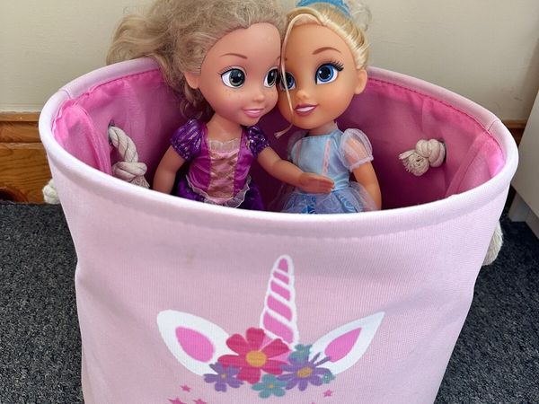 2 x Frozen Dolls and a toy storage basket