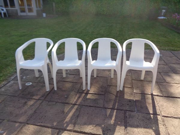 White Stackable Plastic Garden Chairs x 4 for Sale