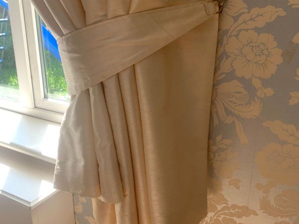 Cream curtains and rail
