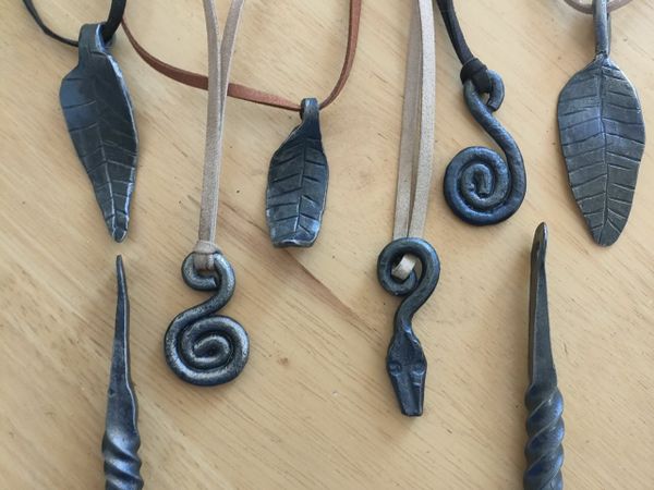 Hand forged necklace pendants