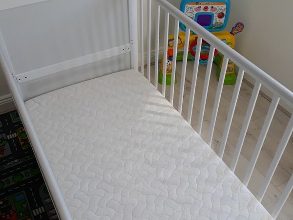 Cot bed with mattress