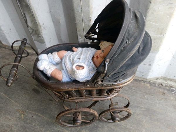 Victorian pram with doll