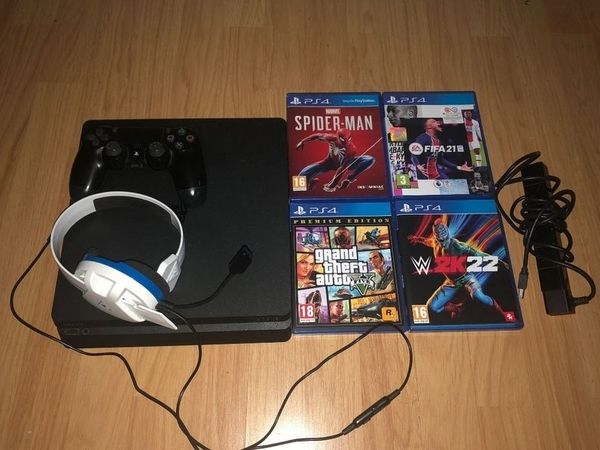 PLAYSTATION 4 SLIM which includes turtle beach headset, PS camera, four games and controller