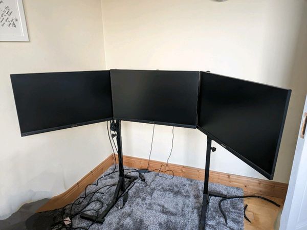 GT Omega triple monitor stand and 3 Asus monitors
