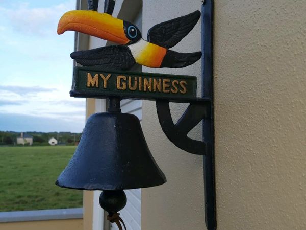 Guinness cast iron bell