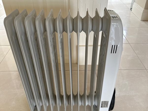 Electric radiator oil-filled, portable, as new for sale in Co. Cork for €40  on DoneDeal