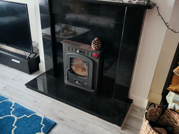 Fireplace and 5kw inset room heater stove for sale in Co. Longford for €499  on DoneDeal